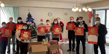 加拿大惠仁会圣诞前夕拜访长者赠口罩送“福”历